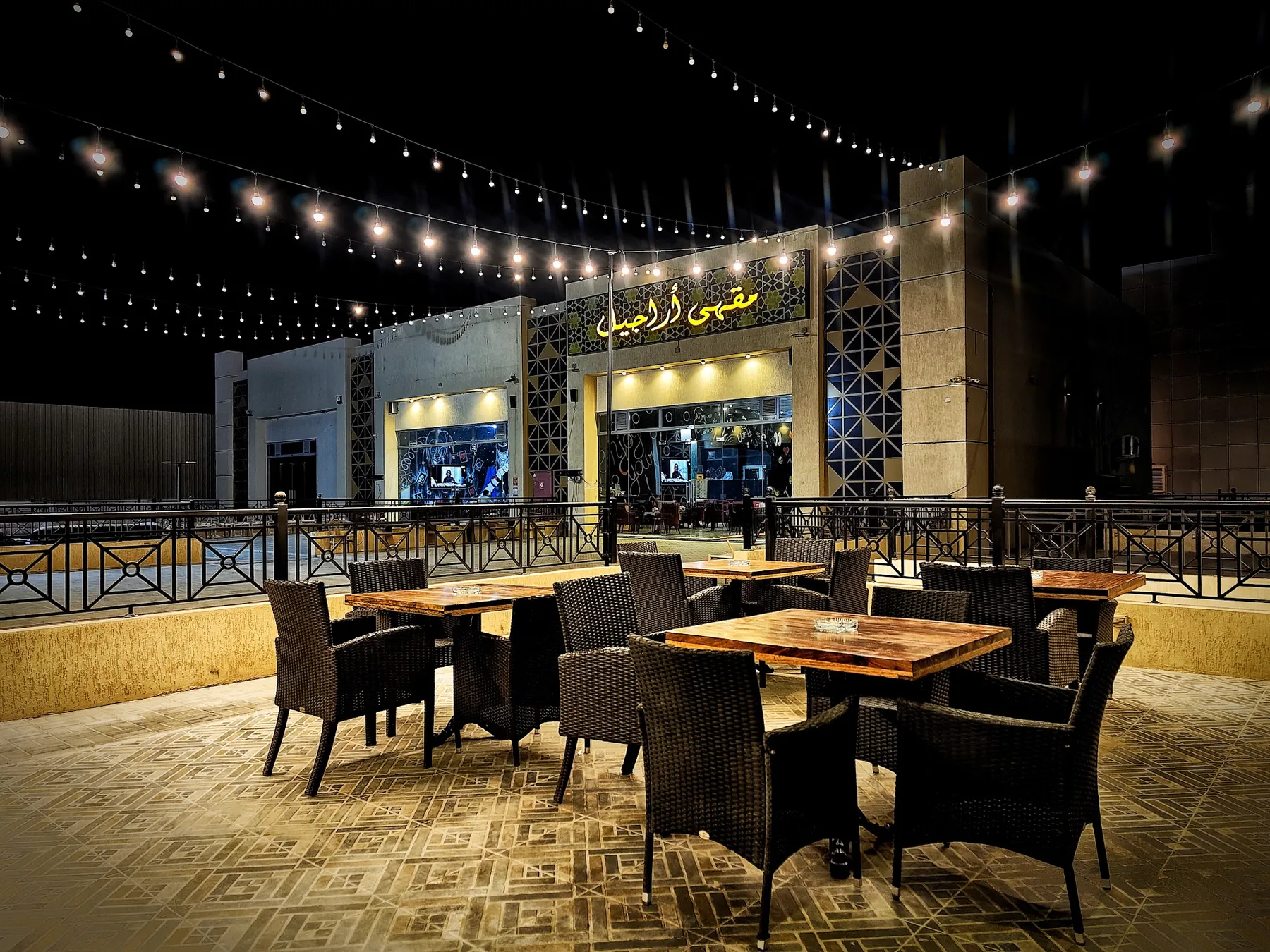 Outdoor terrace seating at The Last Black, Umm Al Quwain